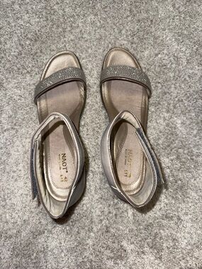 Naot Metallic Taupe Ankle-Strap Sandals Rhinestone Front Band
New. Never worn.